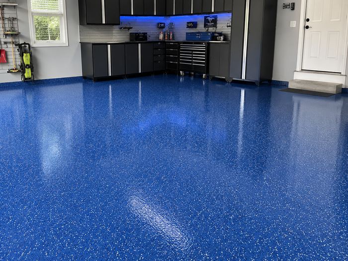 Finished blue speckled epoxy garage floor